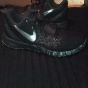 Nike Kyrie's Black and Silver Sneakers
